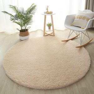 Tapis rond beige pour chambre de bébé