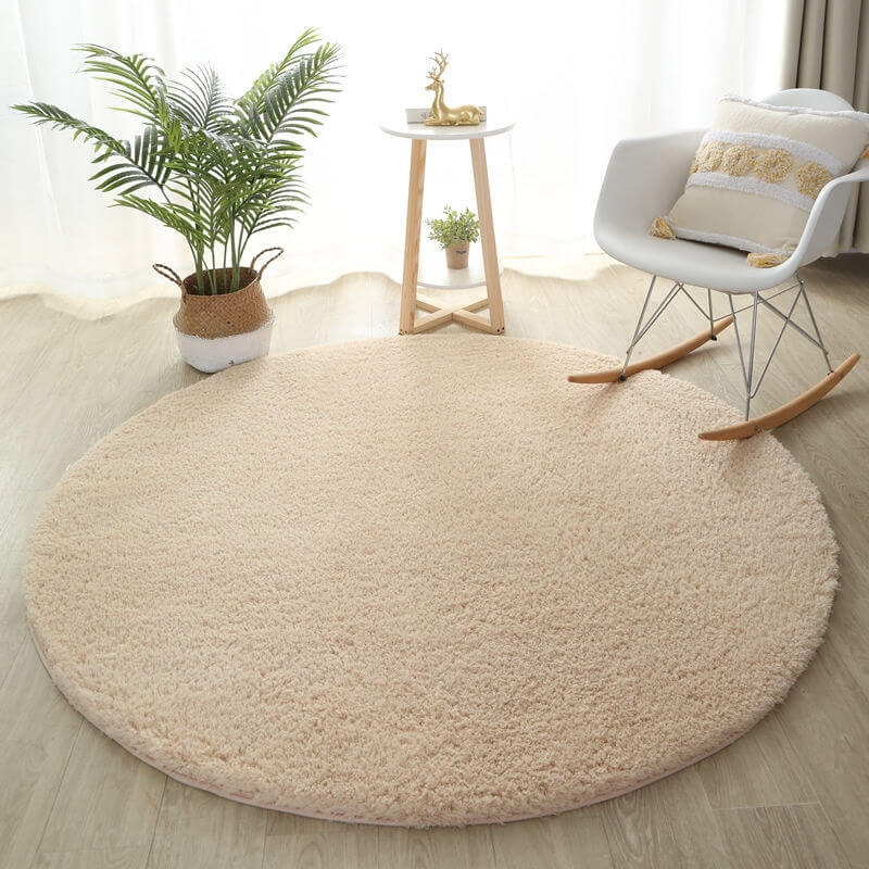 Tapis rond beige pour chambre de bébé
