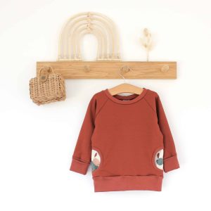 Sweat évolutif rouge à poches